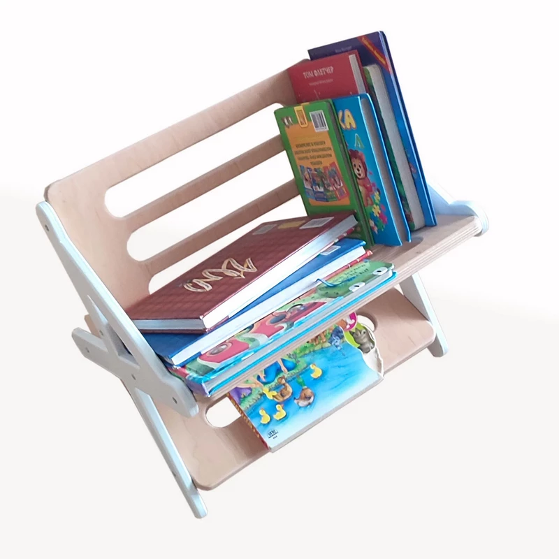 Ein kleines Kinderregal auf dem Boden und ein Tisch Kinderregal, Bücher- und Spielzeugregal, Kinderzimmerregal, Bücherregal, Spielzeugregal, Kindermöbel, Kinderzimmermöbel